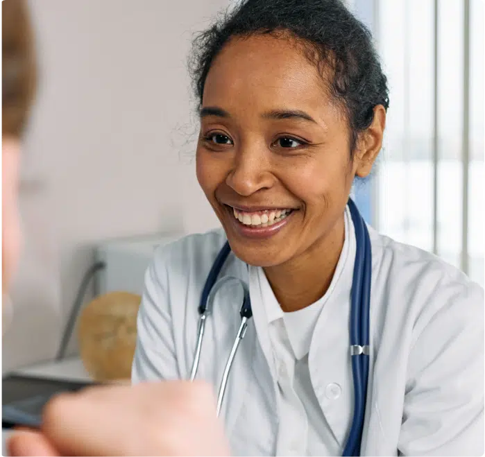 doctor speaking with patient